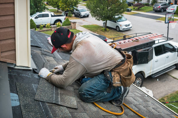 Professional Storm Damage Roof Repair technician working in Berryville, TX